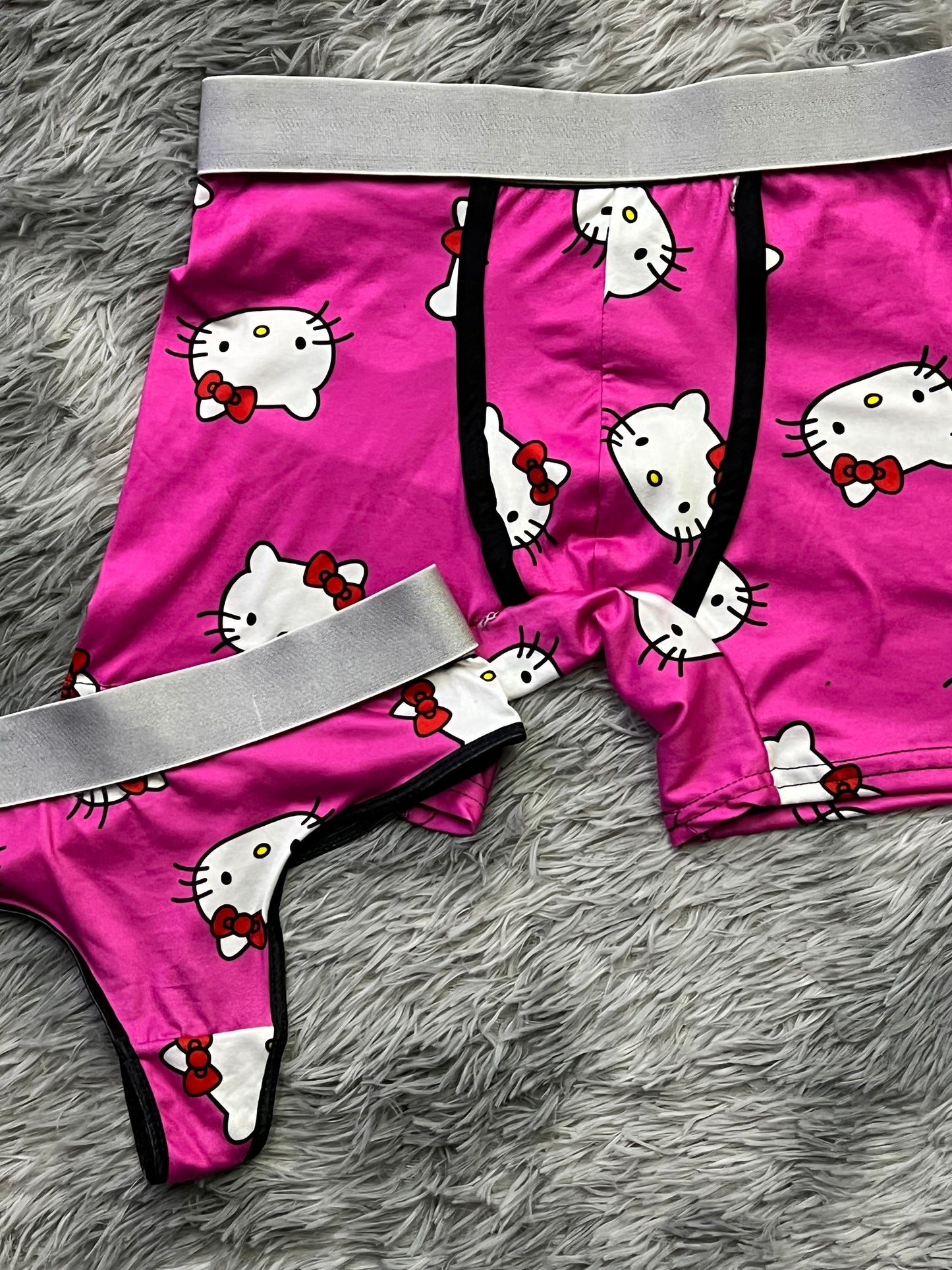 Kitty faces pink background matching underwear