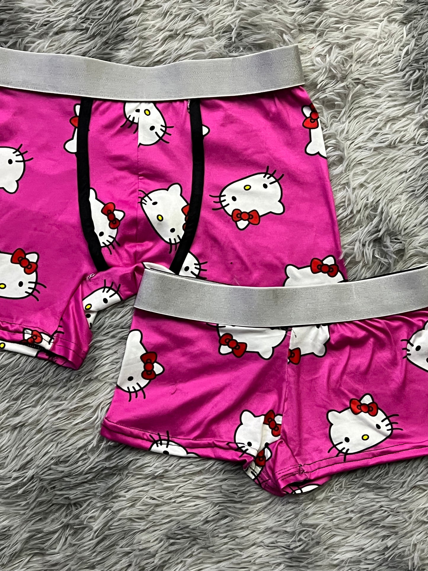 Kitty faces pink background matching boxer underwear