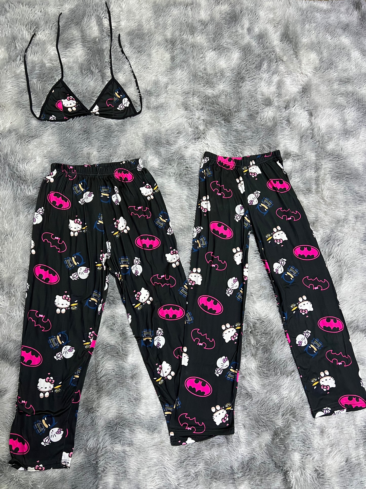 Hello kitty and batman pajama duo