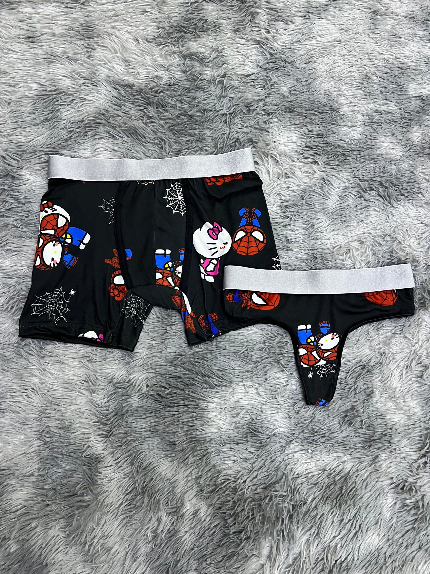 Hello kitty and spiderman white spiderwebs black background matching couples underwear set