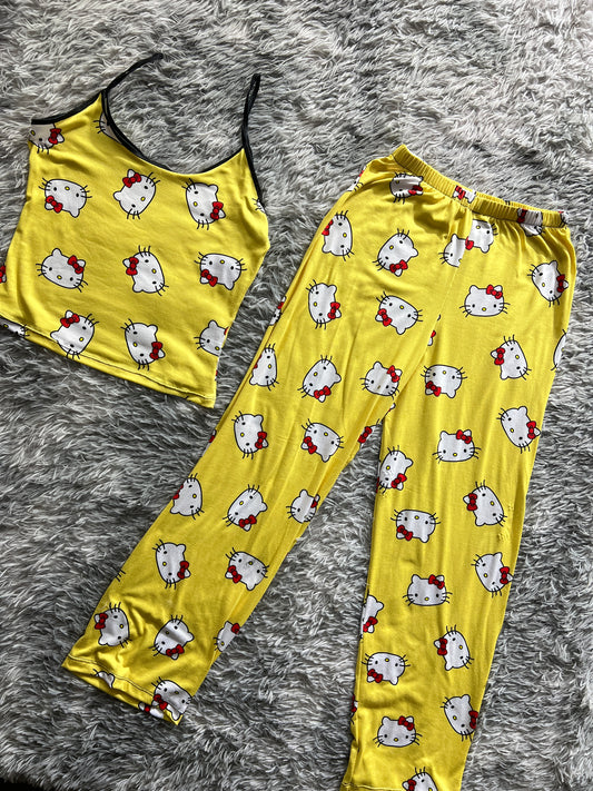 Hello kitty faces yellow pattern blouse and trousers