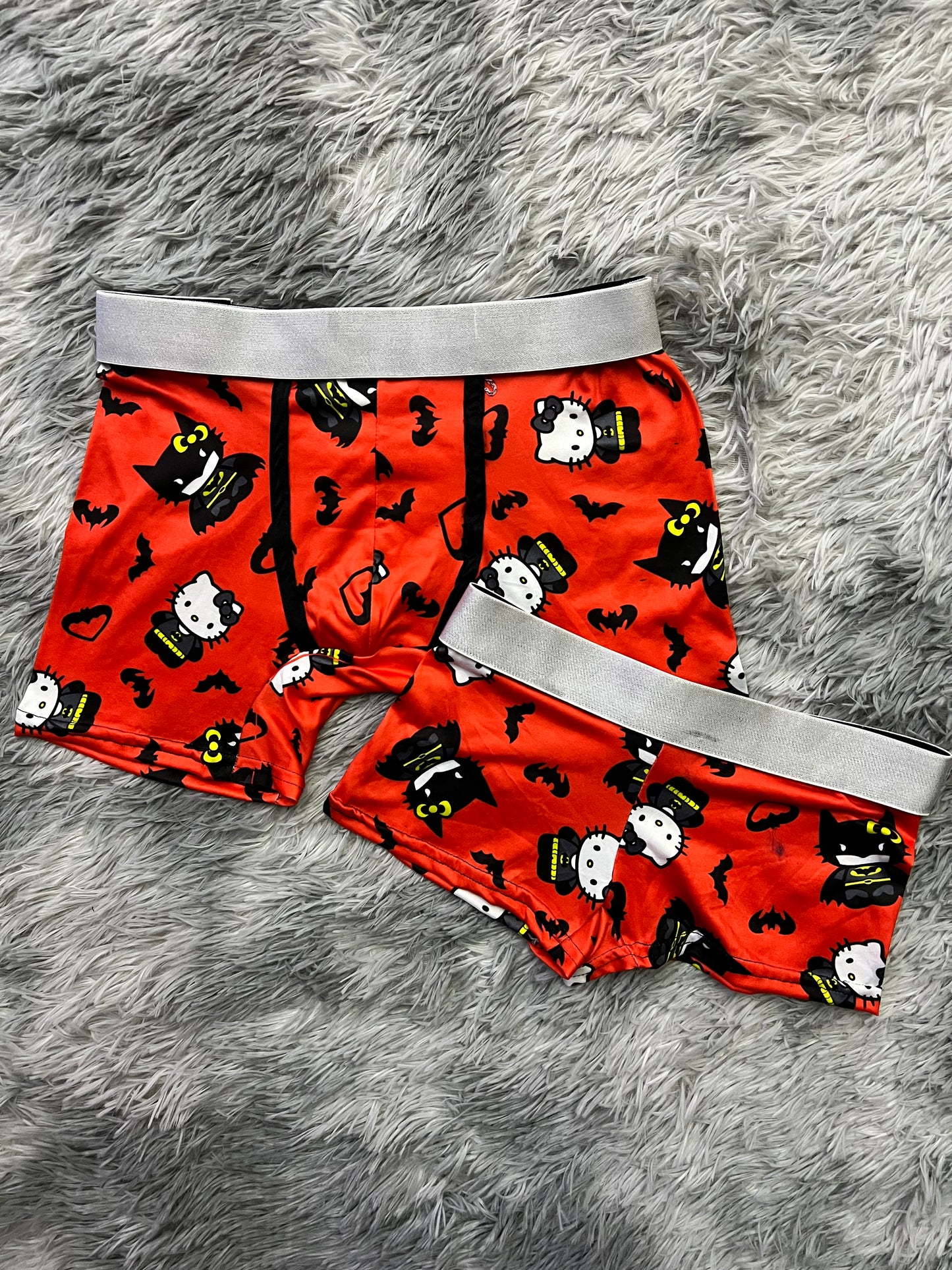 Hello Kitty dressed as Batman orange background matching boxer underwear