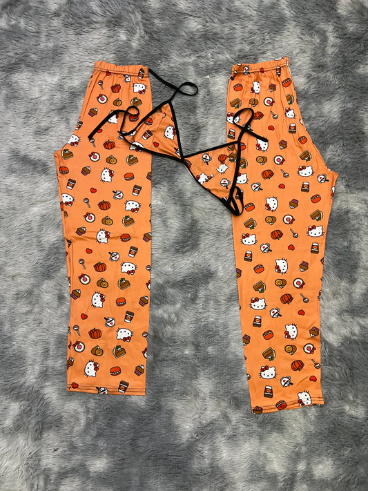 Kitty with pancakes, donut, coffee, cake, popsicles orange background Plush pajama duo