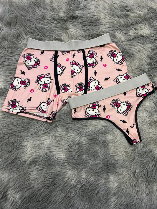 Kitty dressed as a pink background mummy Halloween matching underwear