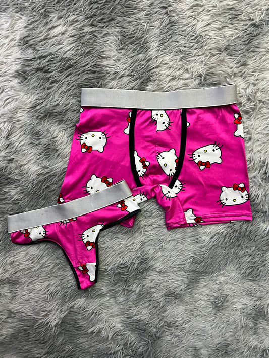 Kitty faces pink background matching underwear