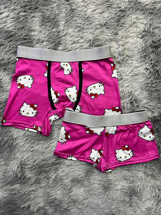 Kitty faces pink background matching boxer underwear