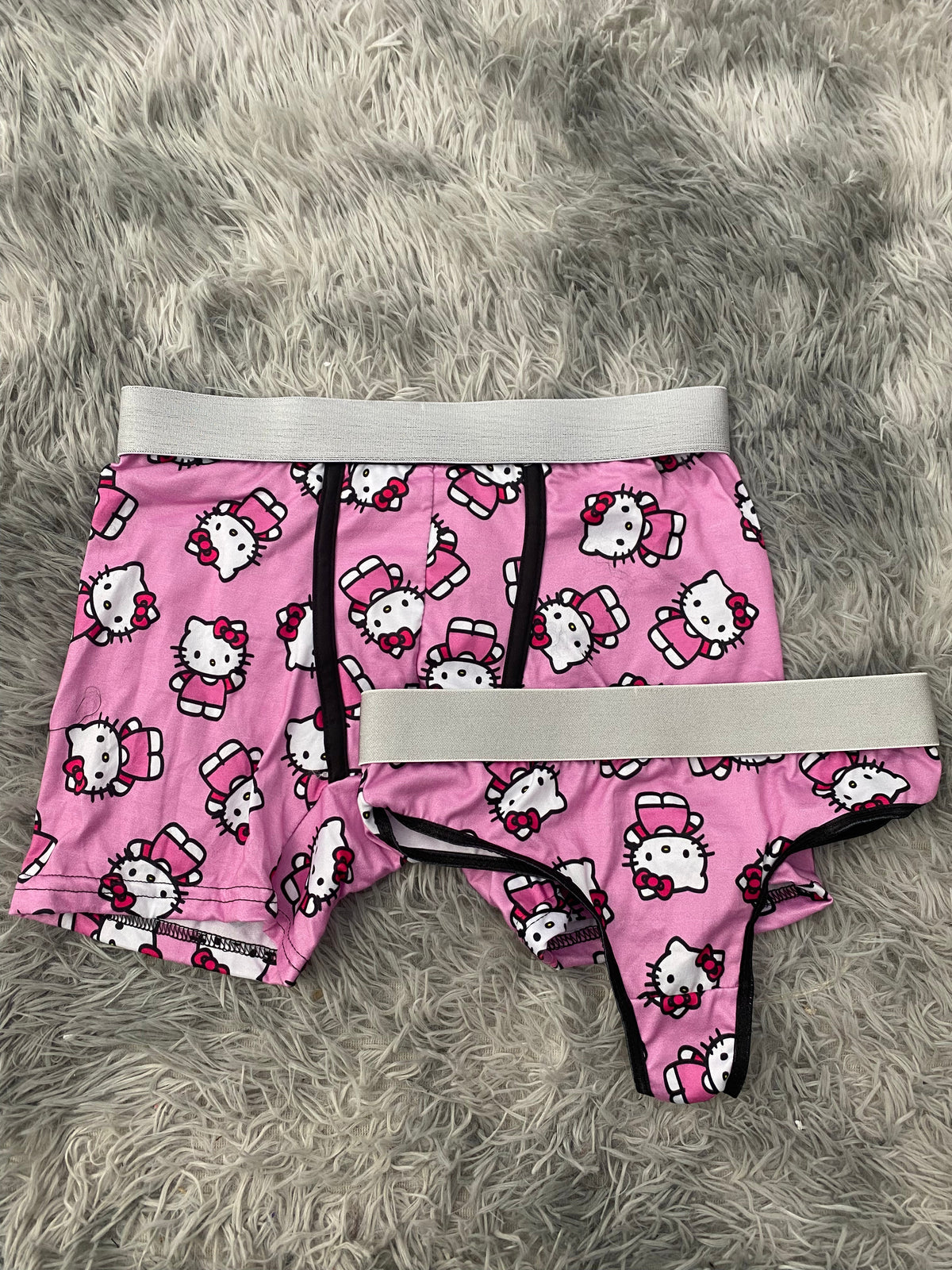 Kitty Waving Pink Background Duo With Thong